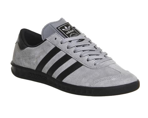 grey and black Adidas shoes